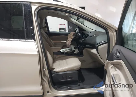 2017 Ford Escape Titanium z USA, uszkodzony, nr VIN 1FMCU0J92HUD90761